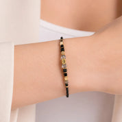 COEUR DE LION Bracciale Wave Cube Flow oro-nero – indossato