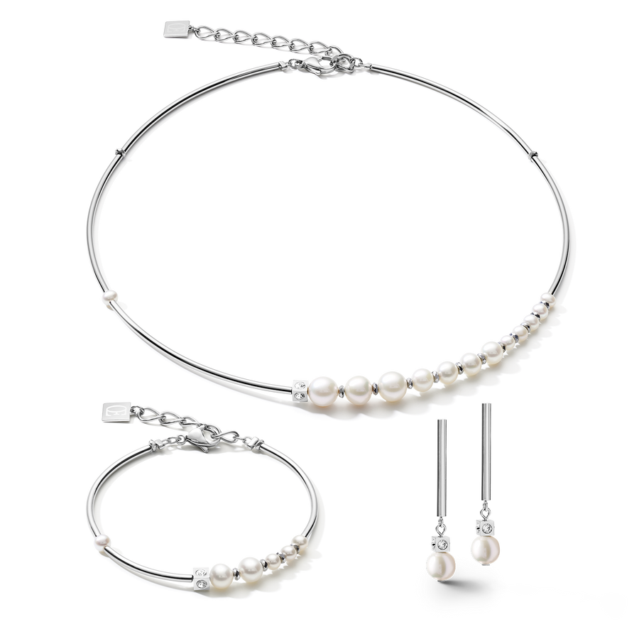 Orecchini Asimmetria perle d'acqua dolce e acciaio inossidabile bianco-argento