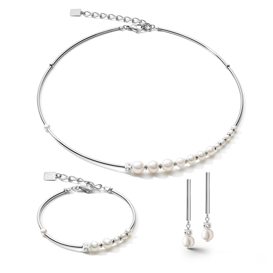 Bracciale Asimmetria perle d'acqua dolce e acciaio inossidabile bianco-argento